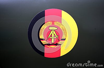 GDR - flag and coat-of-arms Editorial Stock Photo